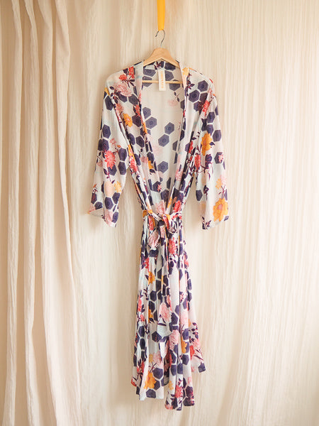 limonata aqua bella chimono robe hanging on a coathanger